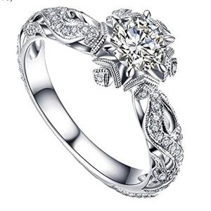 Sterling silver, .5 ct. CZ star engagement ring. Size 10.